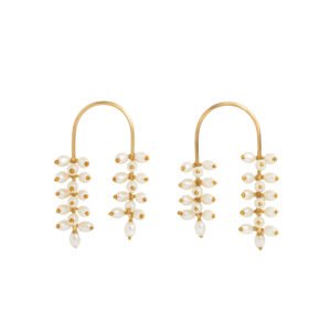 "Fior de Loto earrings featuring 24k gold-plated arches and cascading white pearls"